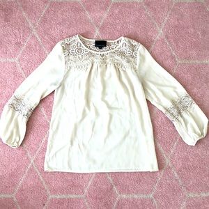 Cream colored blouse